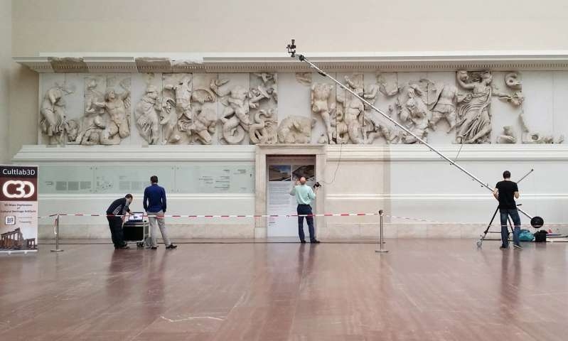 Researchers use a laser scanner to scan the frieze of the Pergamon Altar. Credit: Fraunhofer IGD